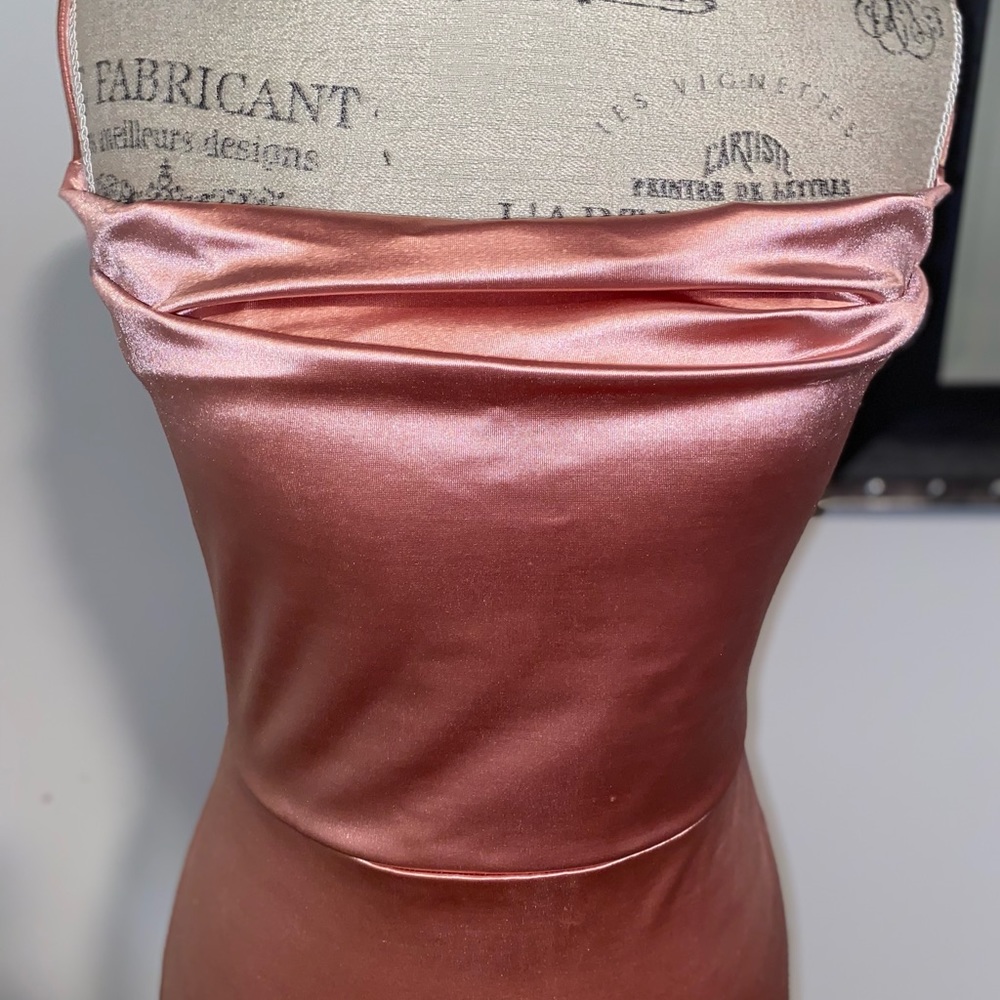 Worn once. Bridesmaid gown in beautiful peachy pink. Elegant and sexy.